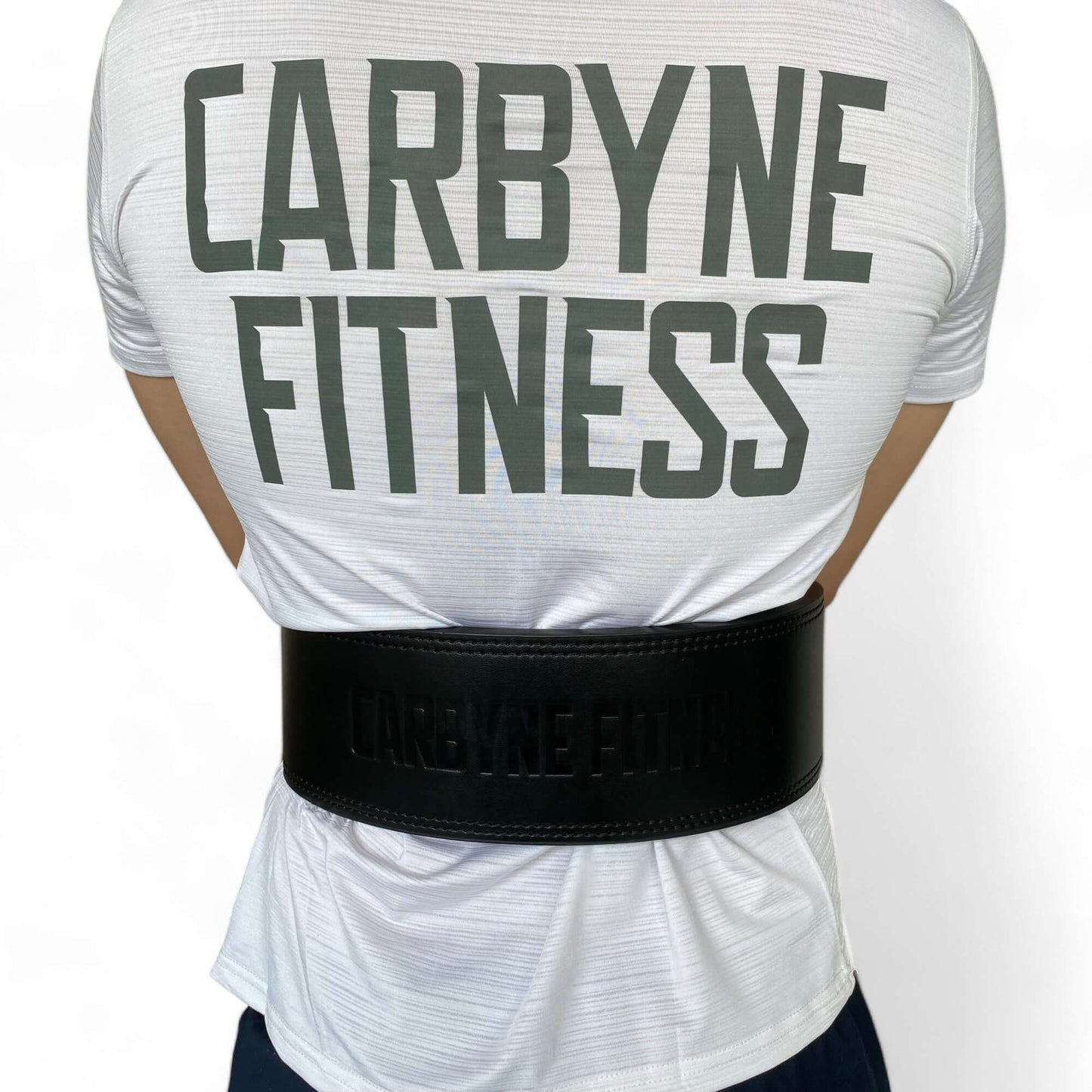 Person wearing CARBYNE Adjustable Lever Weight Belt for gym exercises and weightlifting support.