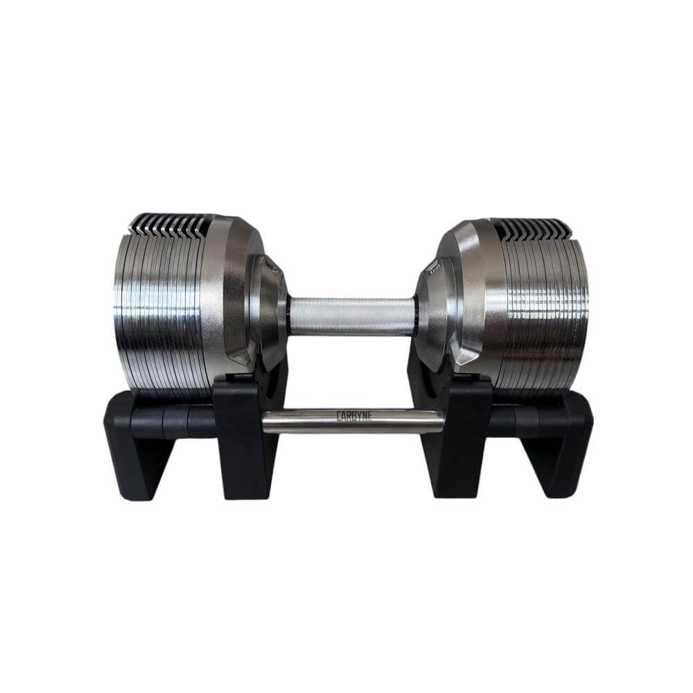 CARBYNE 415 adjustable dumbbell on a stand, featuring sleek design and durable construction for home gym workouts.
