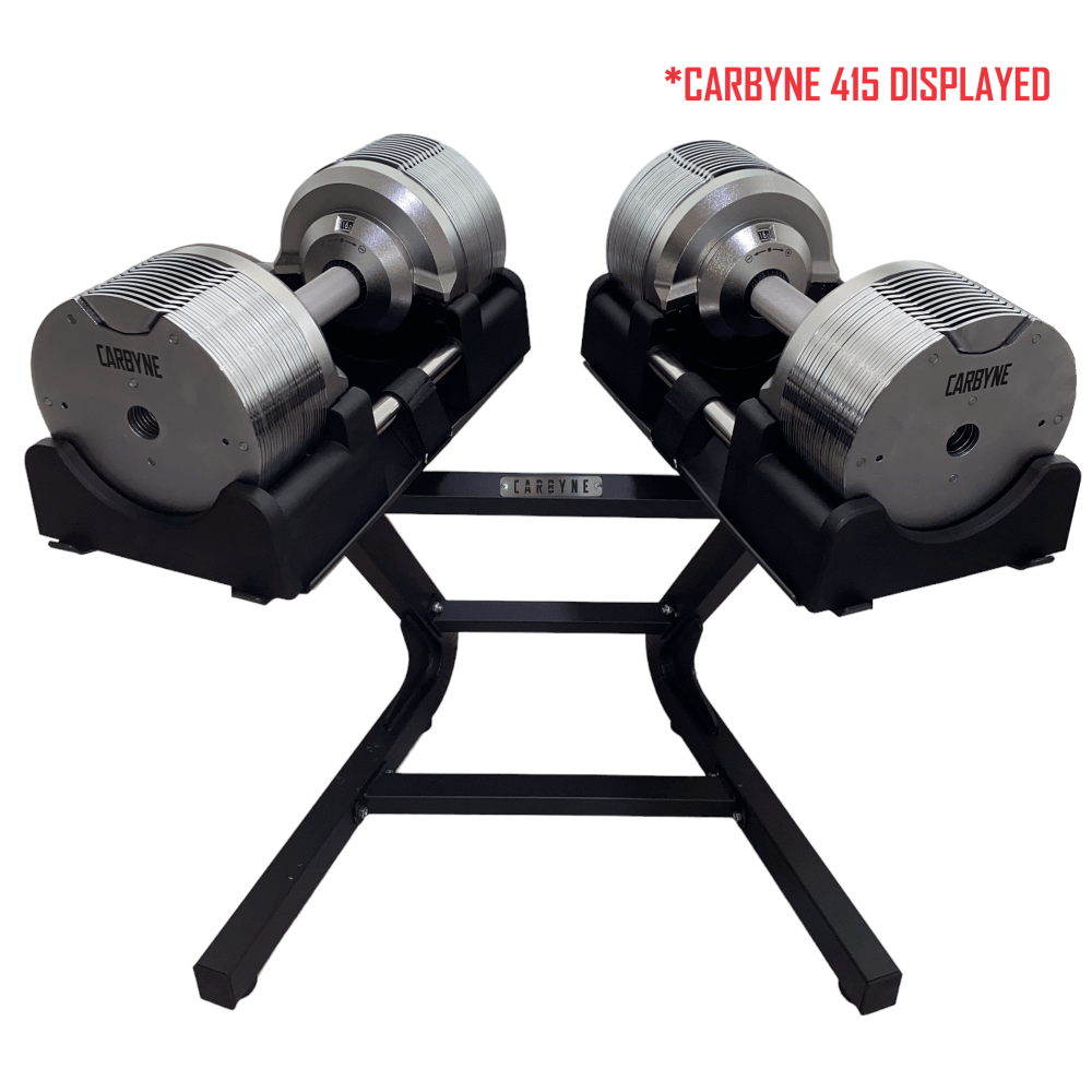 CARBYNE 415 adjustable dumbbells on stand, ideal for home gym workouts, offering weights from 4kg to 41.5kg in sleek design.