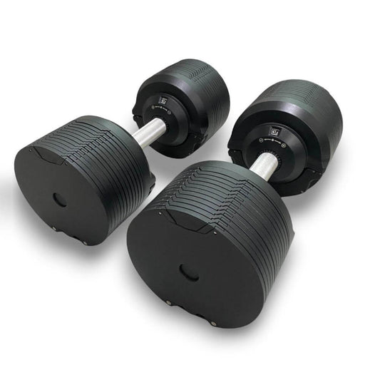 Black CARBYNE 415 adjustable dumbbells for home gym workouts and fitness, ranging from 4kg to 41.5kg, sleek and durable design.