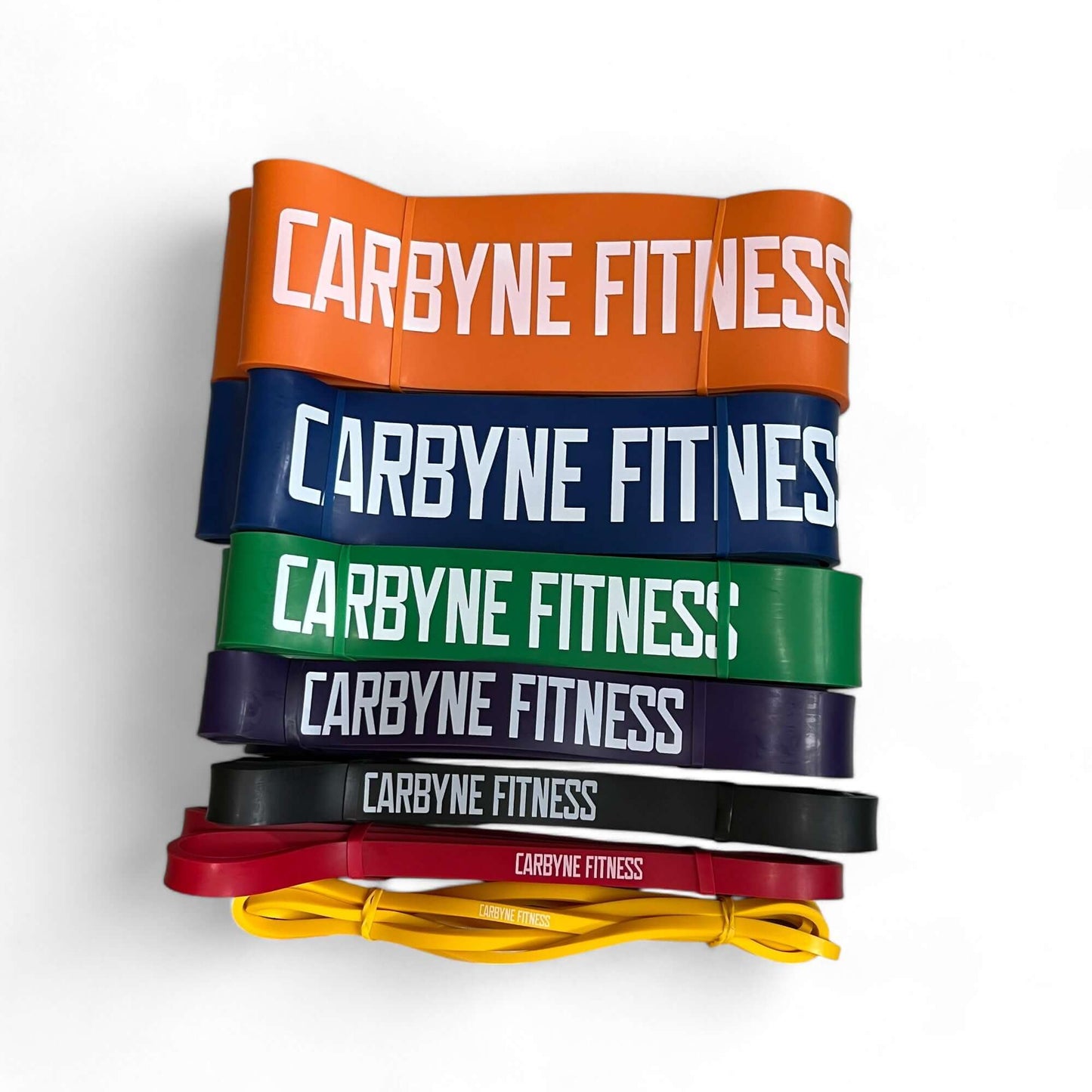 CARBYNE Resistance Bands set in various colors for home gym fitness, offering 7 adjustable resistance levels for low impact workouts.